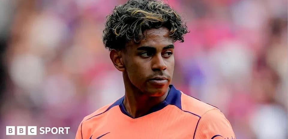 Barcelona player in orange kit during match