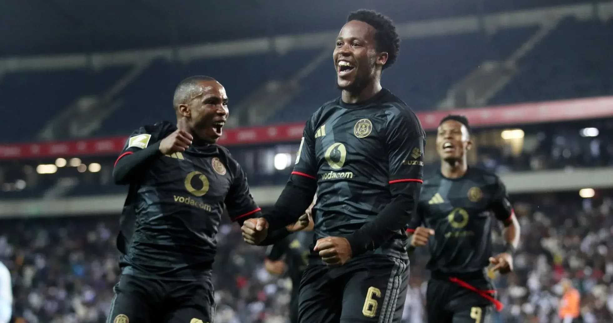 Players celebrating a goal during the match
