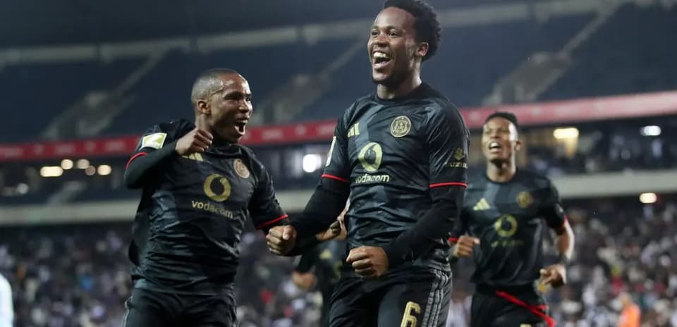 Players celebrating a goal during the match