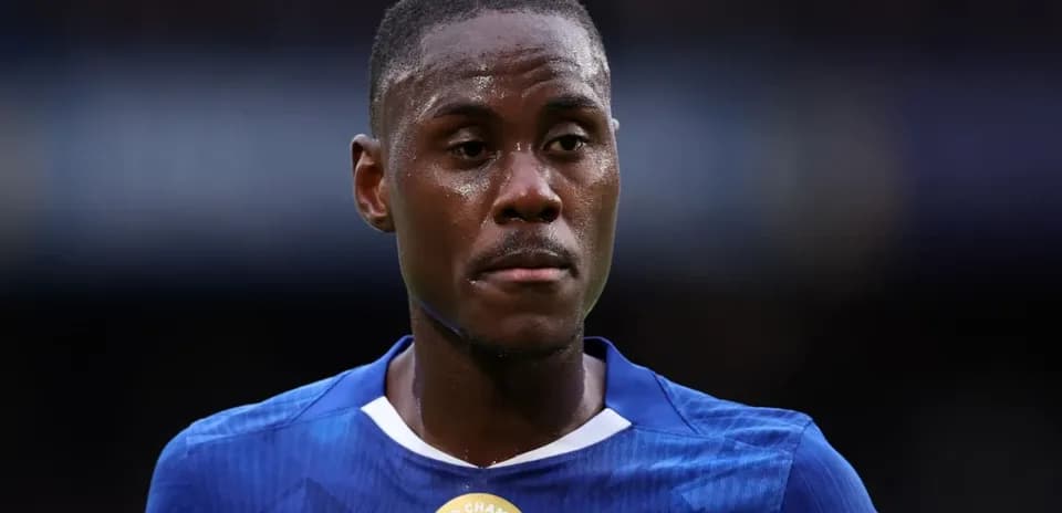 Player wearing blue jersey during match close-up