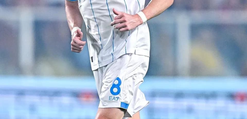 Player in Napoli kit running during a match