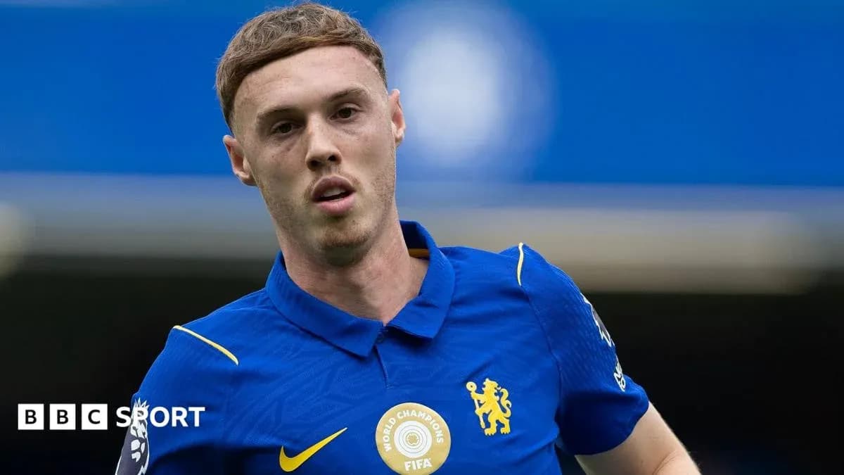 Player in blue Chelsea jersey during match action