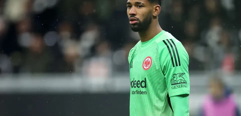 Goalkeeper wearing green kit during match