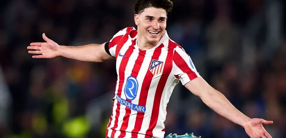Player celebrating a goal for Atletico Madrid