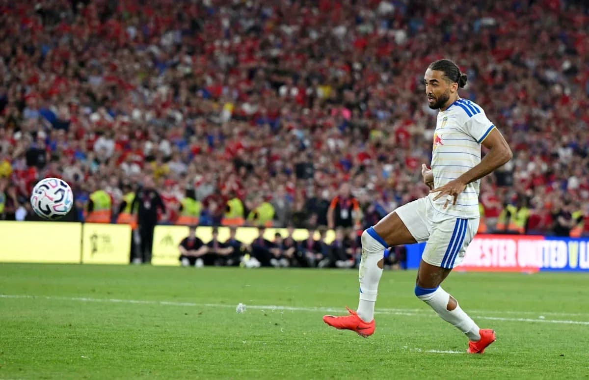 Player kicking a soccer ball during match