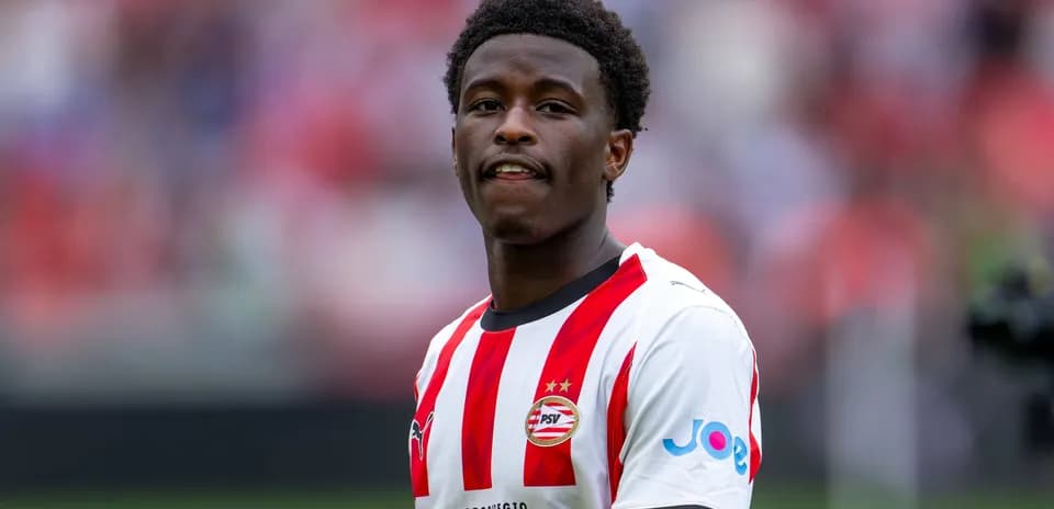 Player in PSV jersey during match warm-up