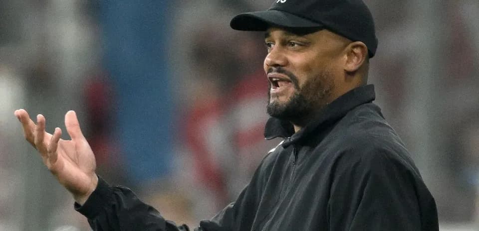 Coach gesturing during a match on the sidelines
