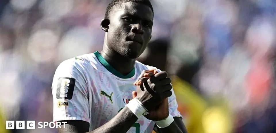 Player celebrating after a match in team jersey