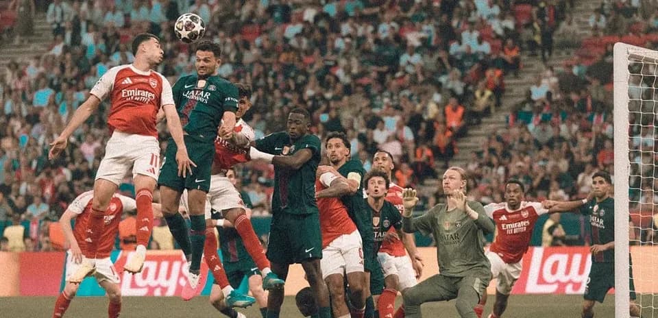Players contesting a corner kick during match