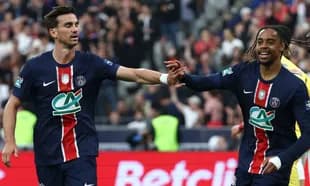 Two PSG players celebrating a goal together