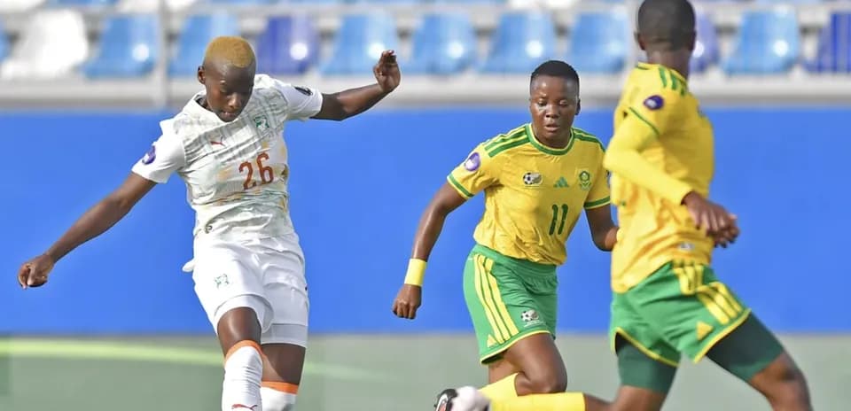 Player 26 kicking the ball during match action
