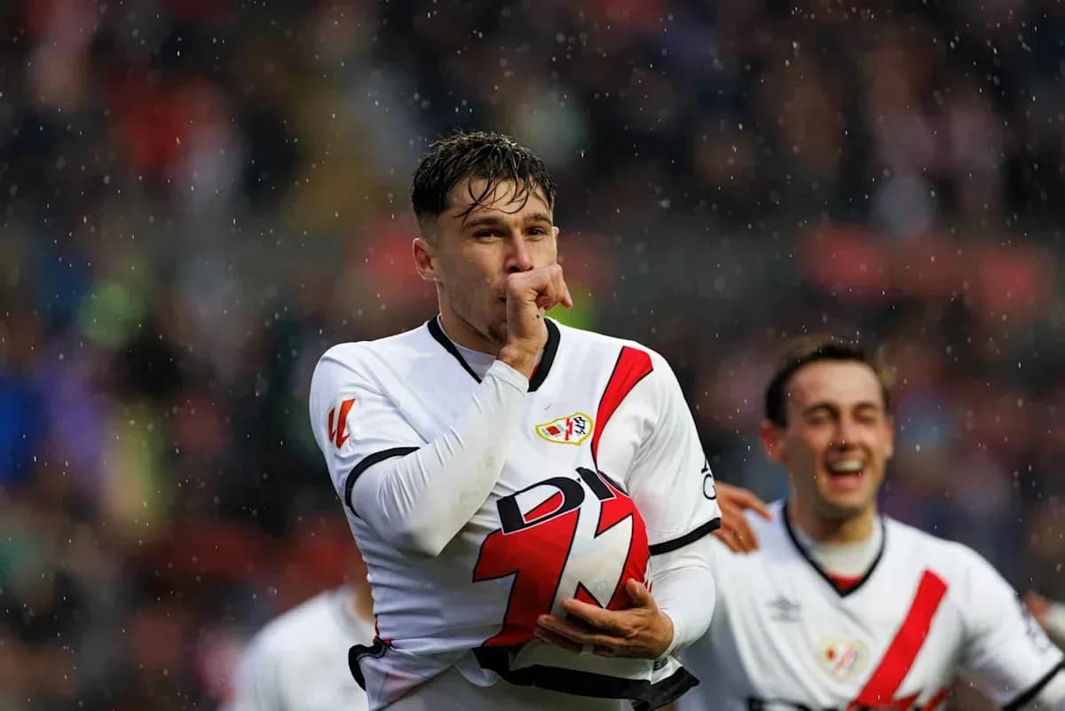Player celebrating with finger to lips after scoring
