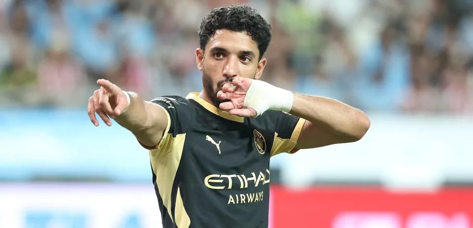 Player celebrating and pointing during match