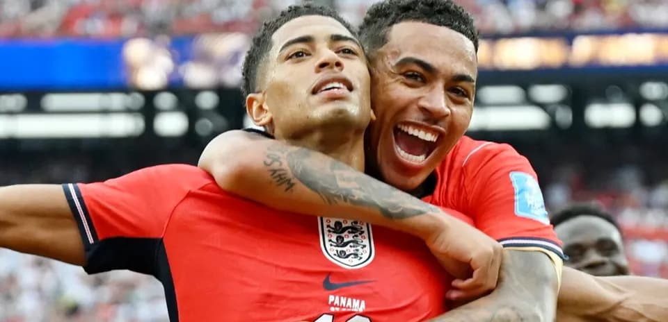 Two players celebrating a goal during match