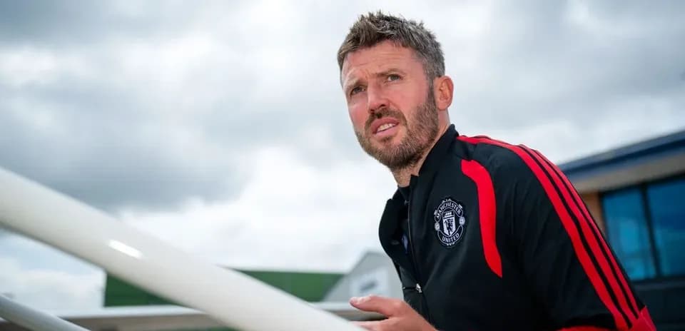 Coach observing surroundings at training facility