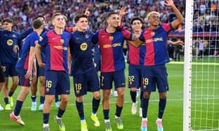 Barcelona players celebrating a goal during match