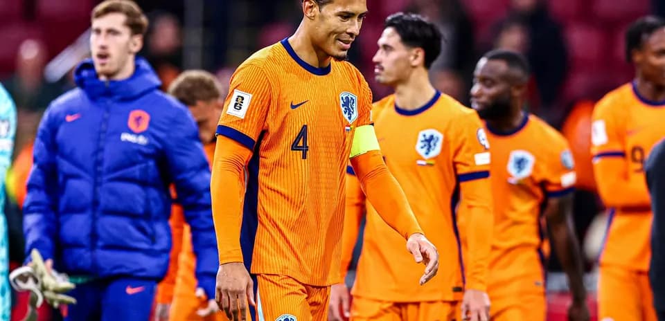 Dutch players leaving the field after match