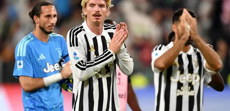 Juventus players applauding fans after the match