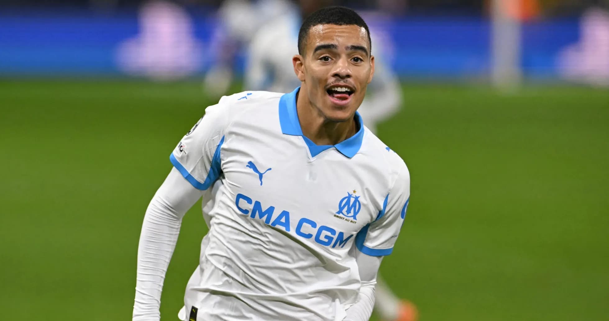 Player celebrating goal in Marseille's white kit