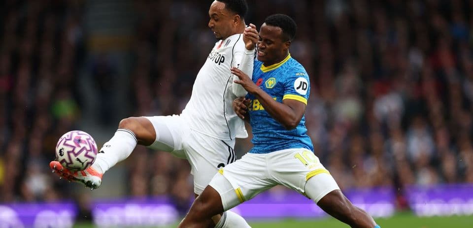 Fulham and Wolves players contesting for the ball