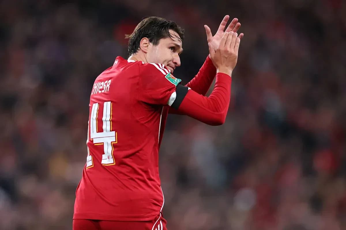 Player applauding fans during a match