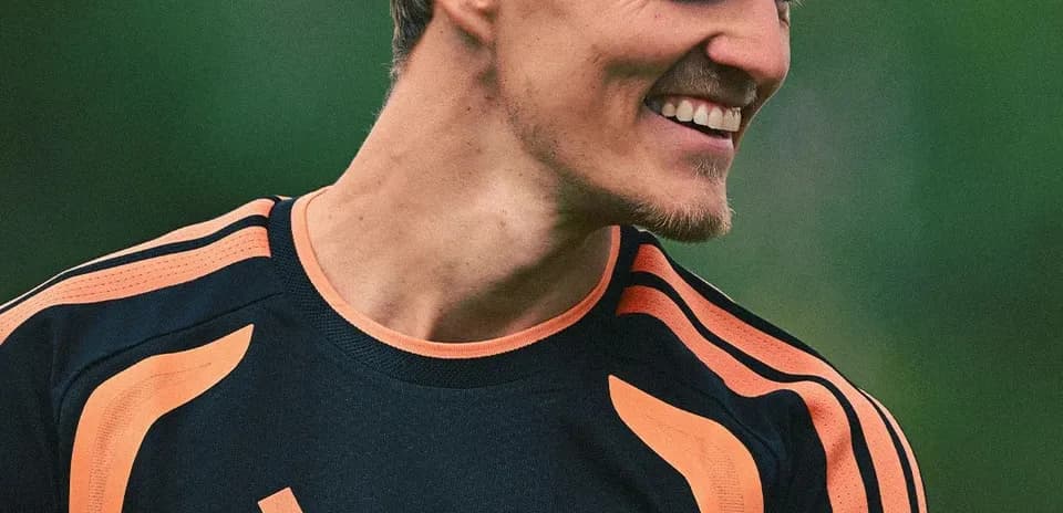 Player smiling in training kit at practice session