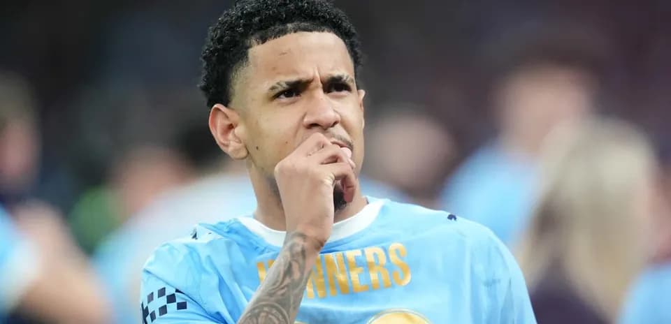 Player in light blue jersey contemplating on the field