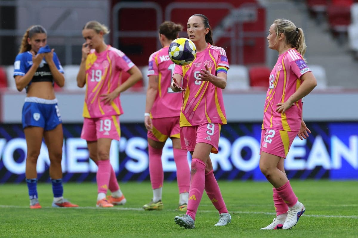Players in pink kits during a match moment
