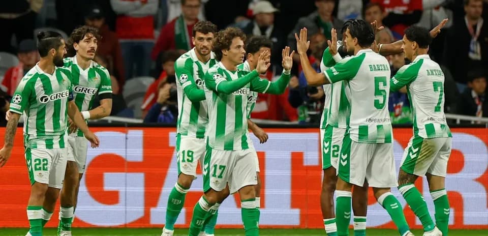 Real Betis players celebrating a goal together