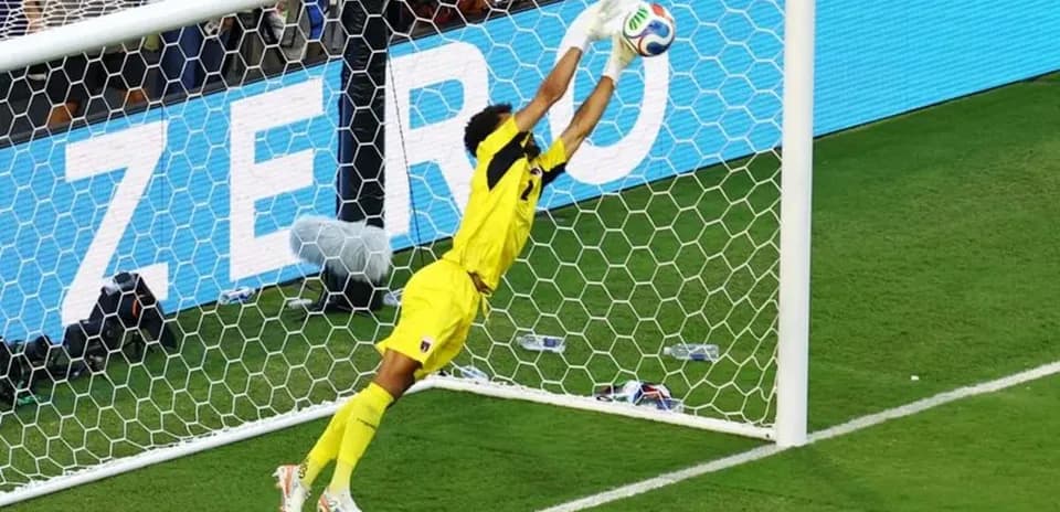 Goalkeeper making a save during a match