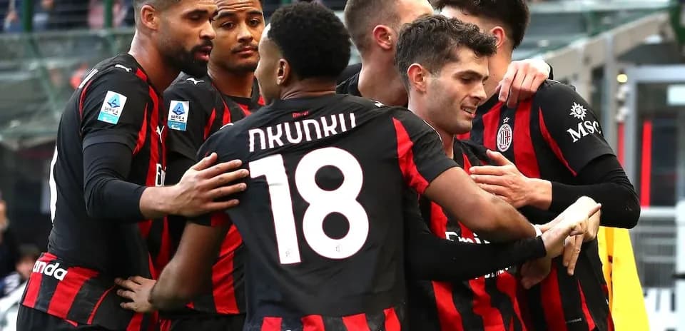 AC Milan players celebrating a goal during match