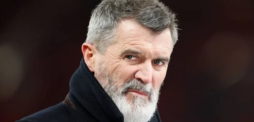 Man with gray beard and serious expression