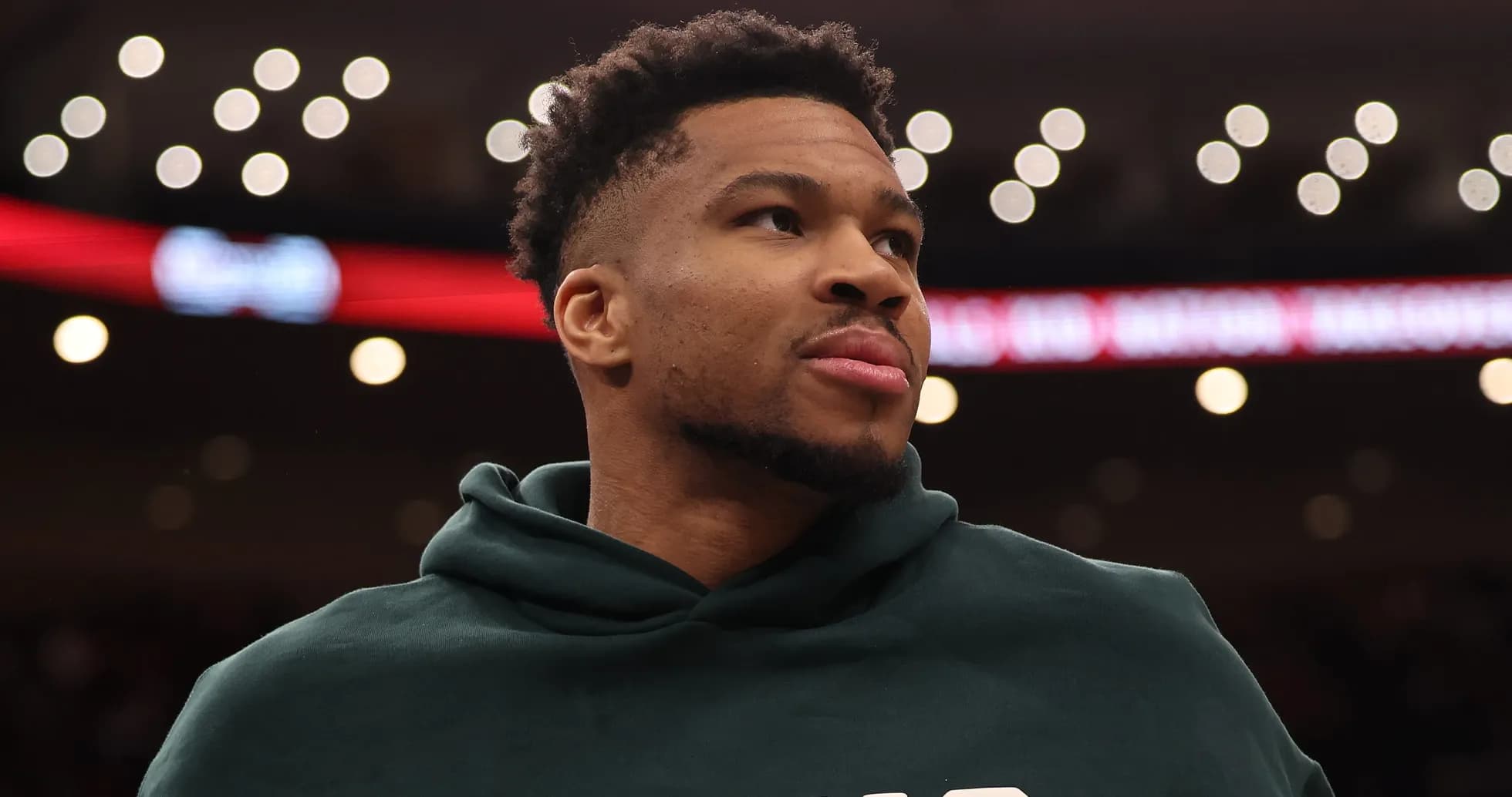 Player wearing hoodie on court during game