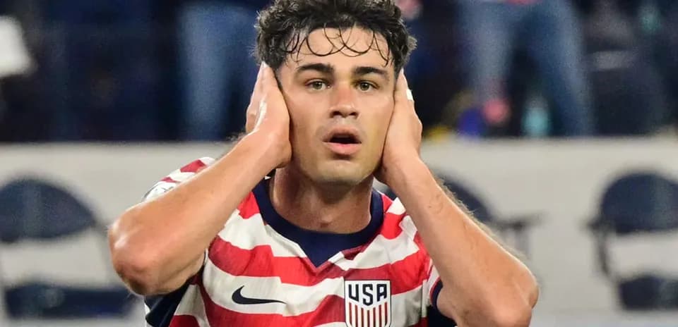 Player holding head in frustration during match