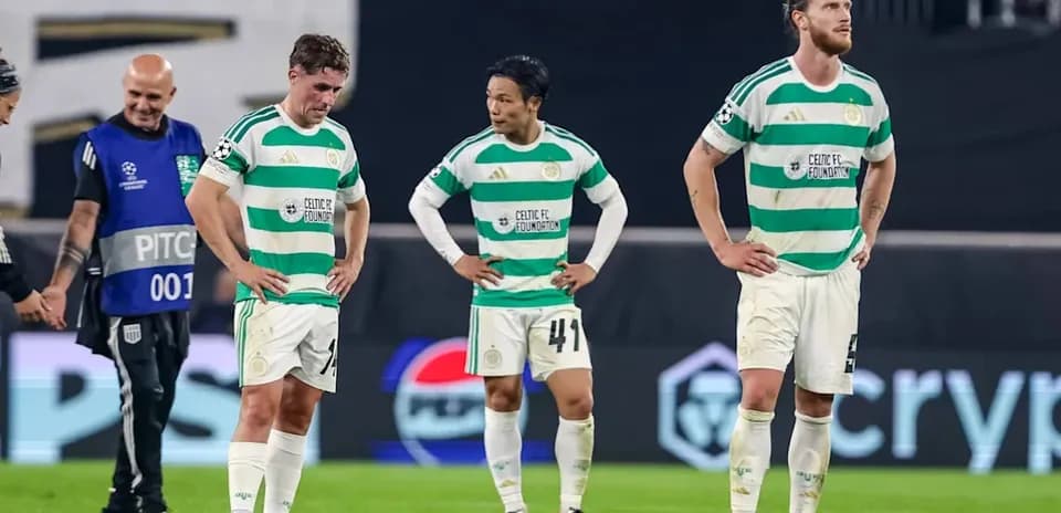 Celtic players reacting after match on the field