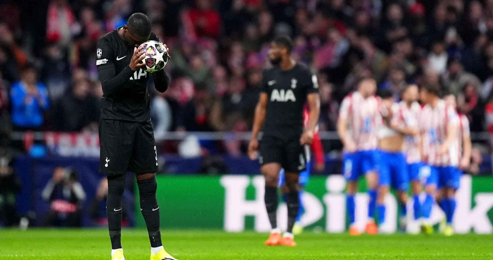 Tottenham player holding ball during UEFA match