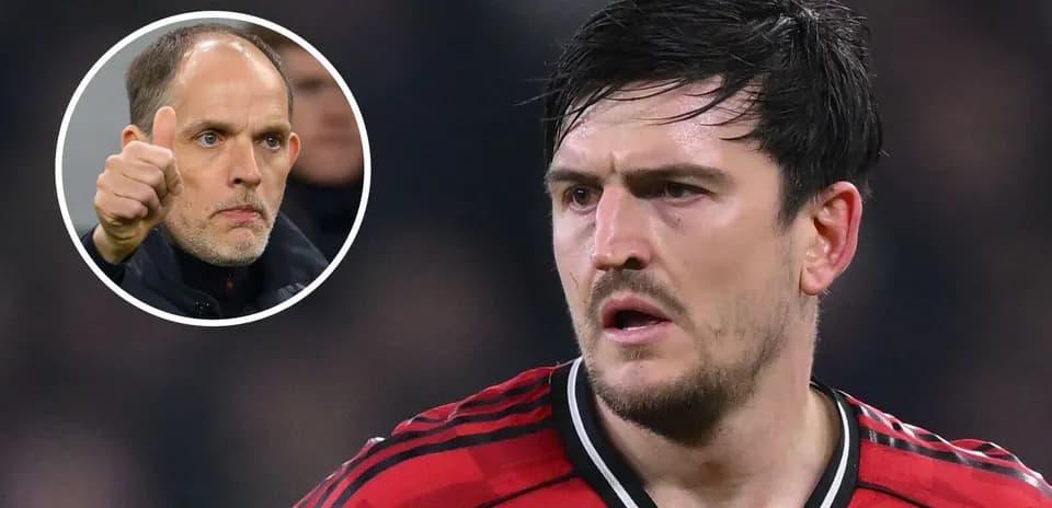 Harry Maguire in red jersey during match with coach
