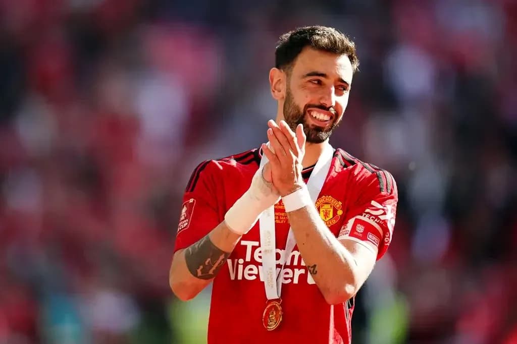 Player celebrating with medal after match