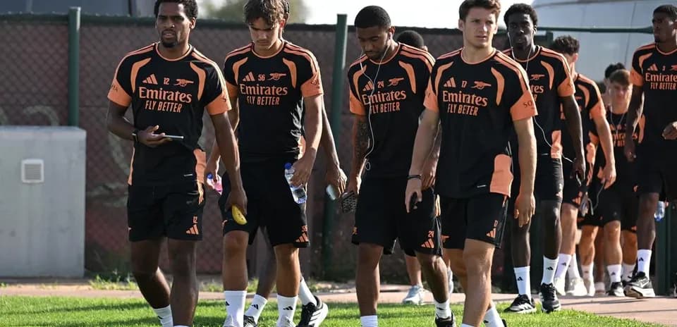 Arsenal players walking during training session