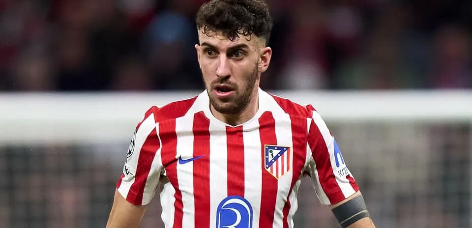 Atletico Madrid player in red and white jersey