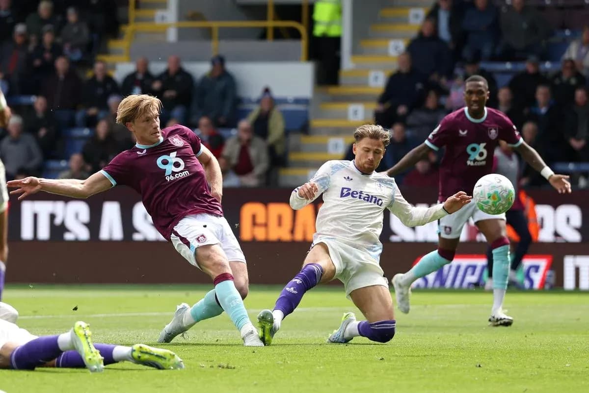 Burnley player tackles Aston Villa opponent