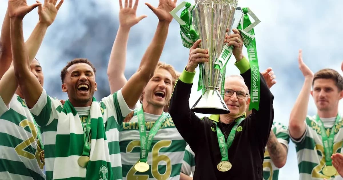 Celtic players celebrating with the championship trophy
