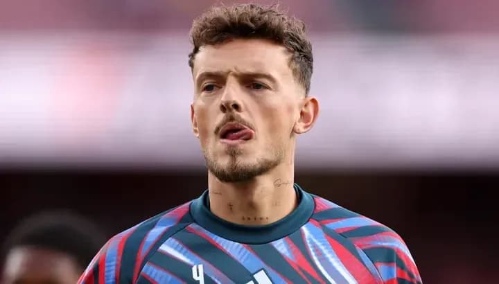 Goalkeeper in colorful jersey during warm-up