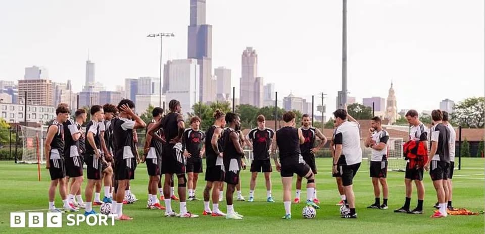 Soccer team gathered during training session outdoors
