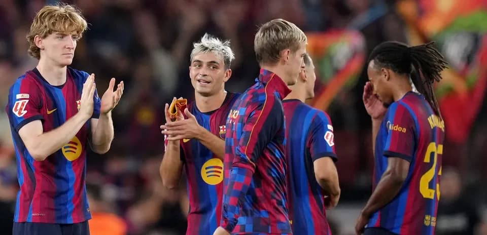 Barcelona players celebrating during a match