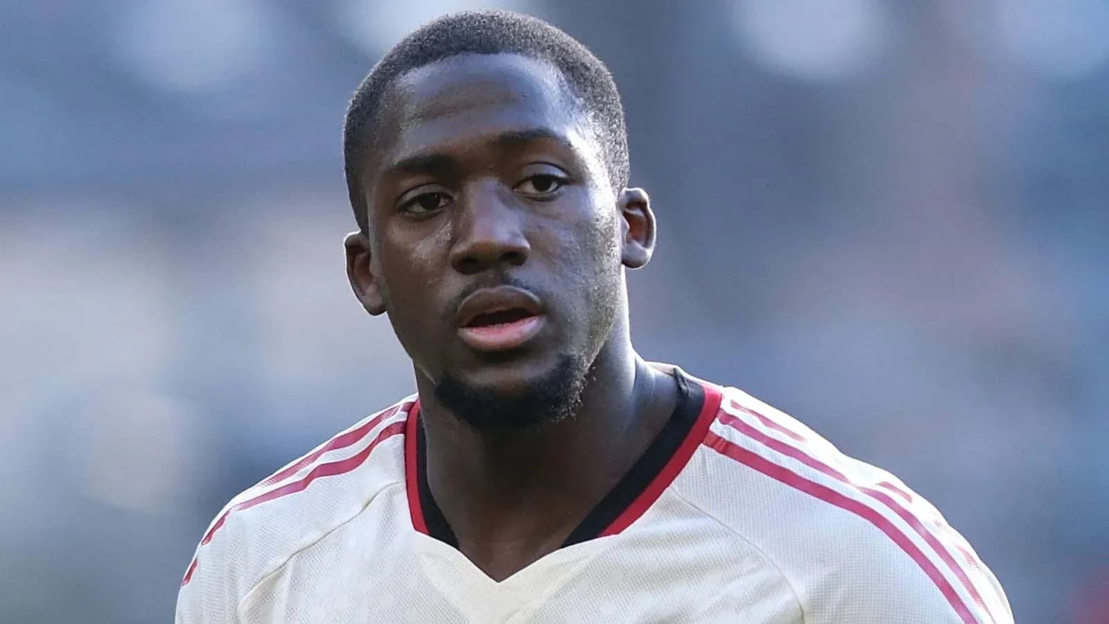 Player in white jersey during match action