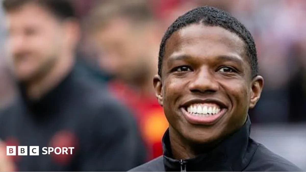 Player smiling before the match on the field