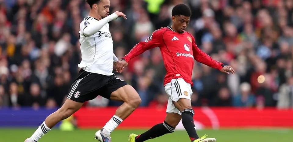 Fulham and Manchester United players in action