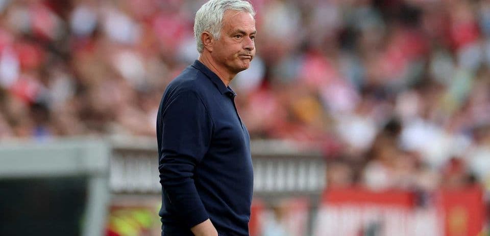 Manager standing on the sidelines during match