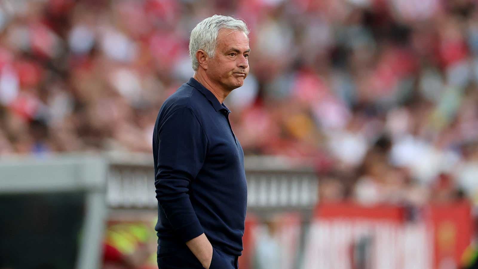 Manager standing on the sidelines during match